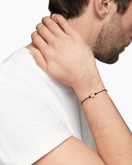 Evil Eye Cord Bracelet in Black Nylon with 18K Yellow Gold and Sapphire, 7.7mm